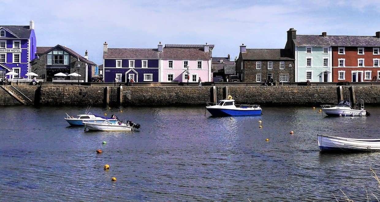 Painted houses on the edge of a picturesque harbour