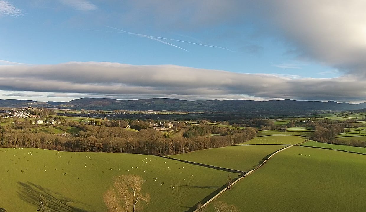 Ariel image showing beautiful countryside surrounding the historic town of Denbigh in the LL16 post code