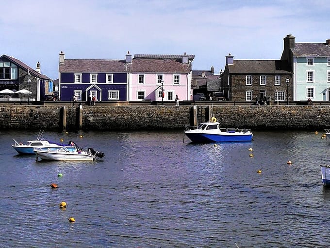 Painted houses on the edge of a picturesque harbour